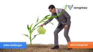 business man watering plant metaphor business growth - SEO
