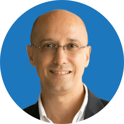 A bald man with glasses smiling while engaging in the State of Digital Selling with LinkedIn®.
