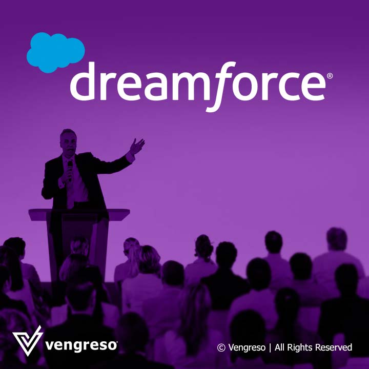 DreamForce man on podium speaking in front of crowd of people