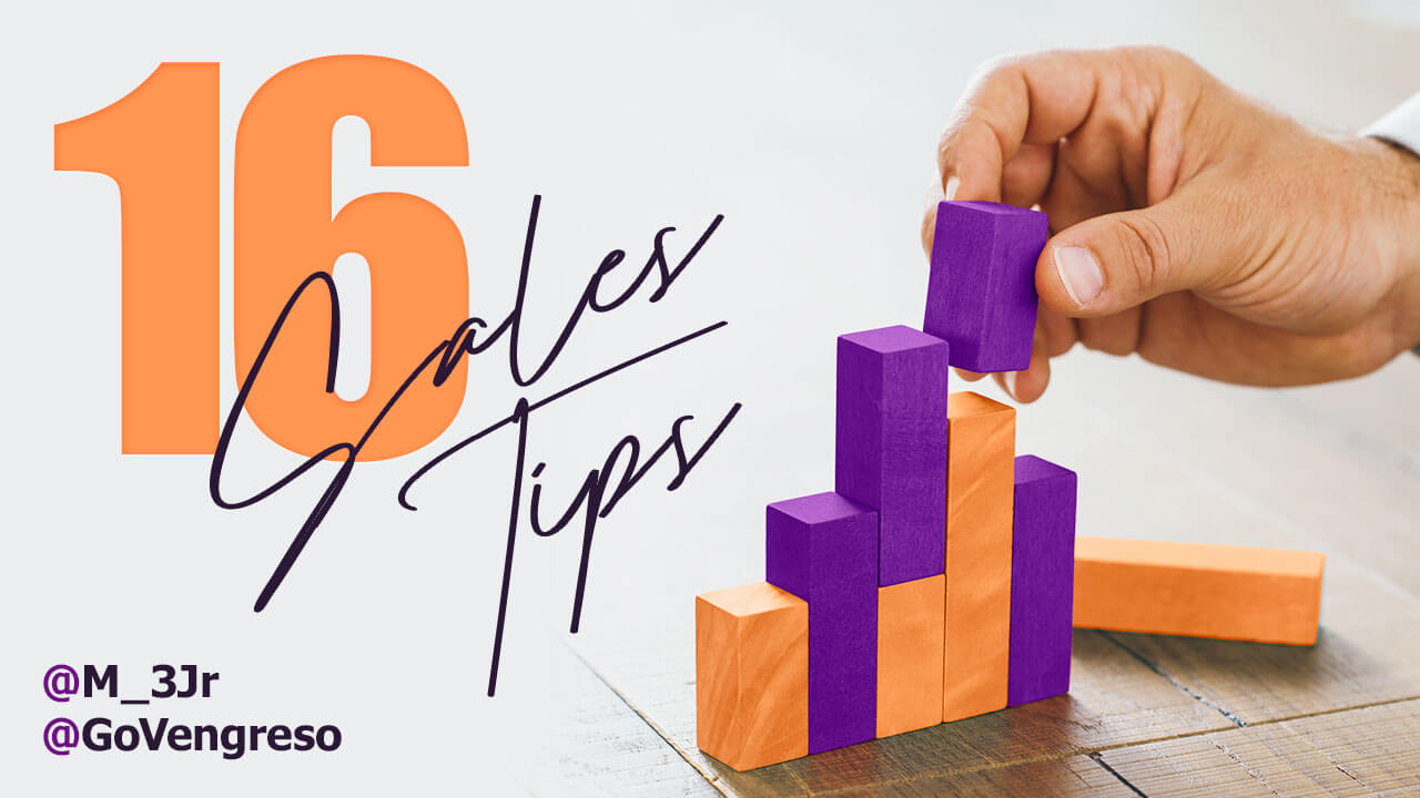 hand placing building blocks on top of each other words read 16 sales tips
