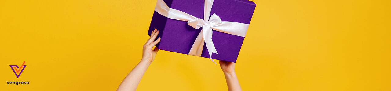 hands holding a purple corporate gift