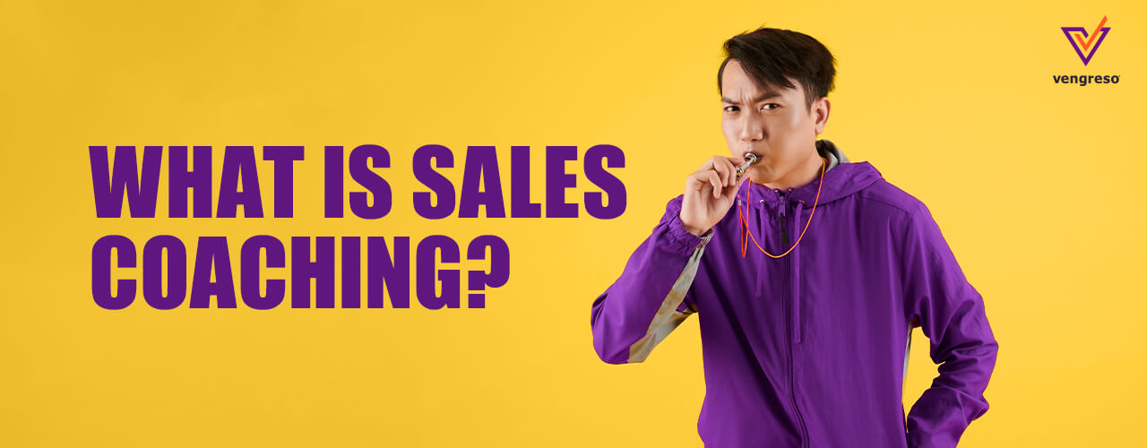 a man blowing a whistle what is sales coaching