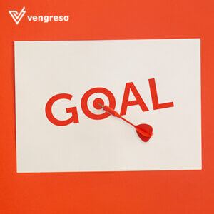 stick it note with the word goal on it with the o being a target and an arrow in the middle