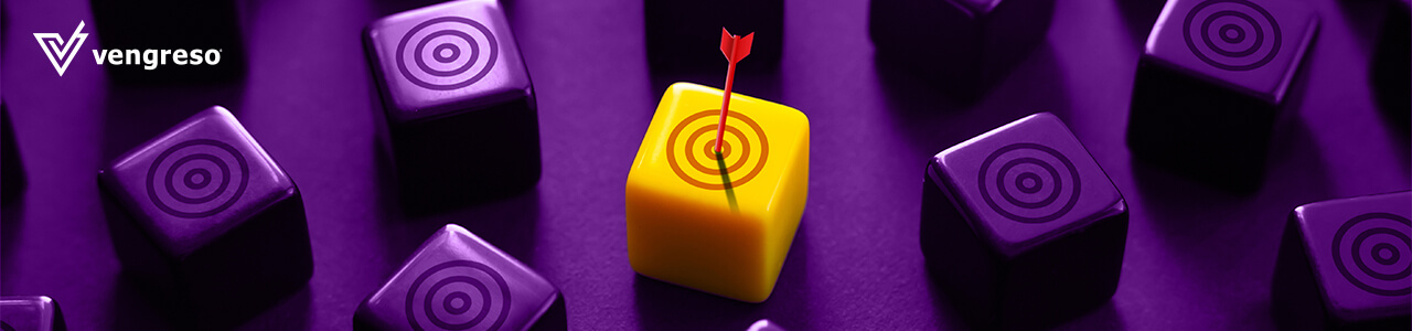 a yellow cube with a target and an arrow among purple cubes 