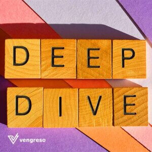 The word "deep dive" spelled out in wooden blocks on a colorful background, showcasing text expansion tool mastery.
