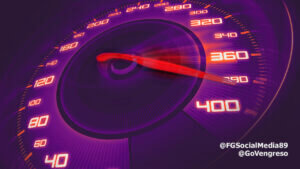 A purple speedometer with a red light on it, utilizing text expander.