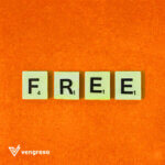 The word "free" spelled out in scrabble letters on an orange background demonstrates the application of text expander.