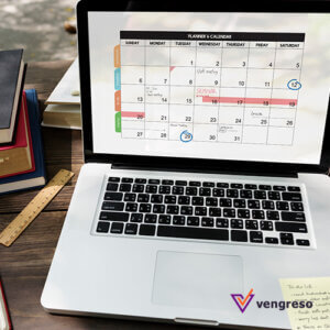  A laptop with a calendar on it, perfect for organizing your schedule, sitting on a desk. Ideal for a LinkedIn post showcasing productivity tools!