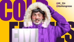 A man wearing a purple winter jacket with a fur-lined hood and ski goggles is in front of a laptop. His face is covered in frost, and he has a distressed expression. The large yellow text in the background reads "COLD EMAILS WORK." Social media handles @M_3Jr and @GoVengreso are displayed in the top right corner.