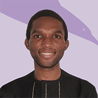 A man with short black hair and medium brown skin is smiling at the camera. He is wearing a black shirt with white stitched detailing. The background features a light purple shade with abstract, darker purple shapes, capturing the vibrant spirit of our team.