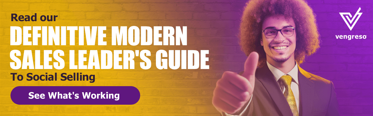 A man with curly hair, glasses, and a suit gives a thumbs-up in front of a brick wall. The text reads, “Read our Definitive Modern Sales Leader’s Guide to B2B Sales.” There's a button labeled "See What’s Working" and the "vengreso" logo in the top right corner. The background is yellow and purple.