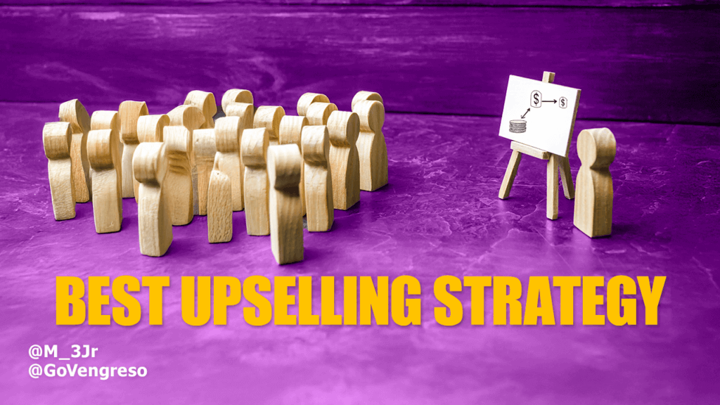 A group of wooden figurines face a smaller figure standing near an easel with a money sign graphic. The background is a purple surface, and the bold yellow text "Best Upselling Strategy" is at the bottom. Twitter handles @M_3Jr and @GoVengreso share effective techniques to boost sales in white text at the bottom left corner.