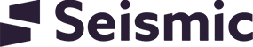 Logo of Seismic featuring the word "Seismic" in dark purple bold letters. To the left of the text, there is a stylized geometric design composed of two overlapping, dark purple quadrilaterals with a negative space in the shape of an "S". The background is white.