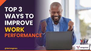A smiling man in a suit sits at a desk, celebrating with raised fists while looking at his laptop. To the left, bold text highlights “3 ways to improve work performance.” The Vengreso logo appears in the bottom right corner.
